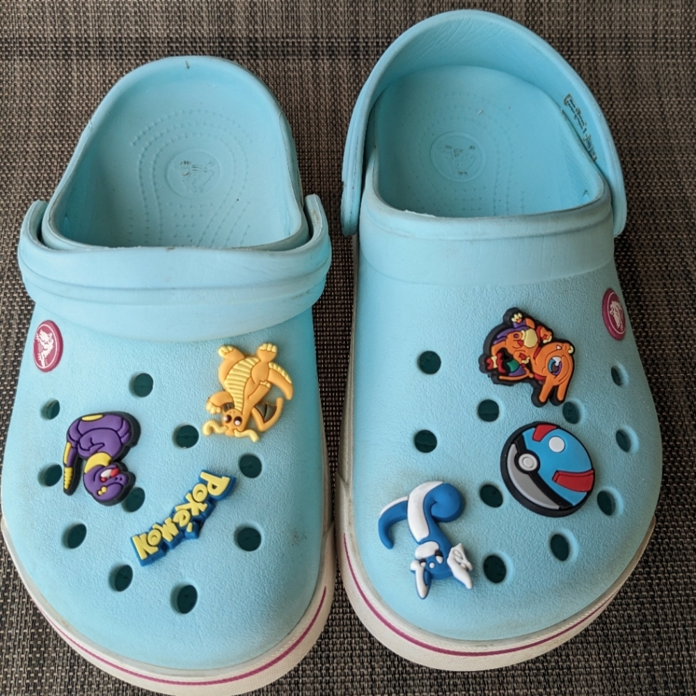 Great pair of Crocs size 2 with bonus Pokemon charms